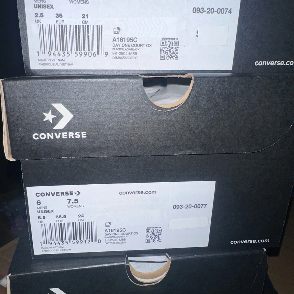 All Black Low-Top Leather Sneakers
